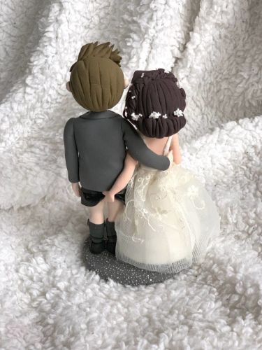 Picture of Love pinch wedding cake topper, Funny cake topper