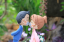Picture of Kissing Ao dai wedding cake topper, Mixed race wedding cake topper