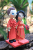 Picture of Chinese wedding cake topper, Chinese traditional wedding dress clay miniature