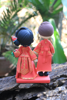 Picture of Chinese wedding cake topper, Chinese traditional wedding dress clay miniature