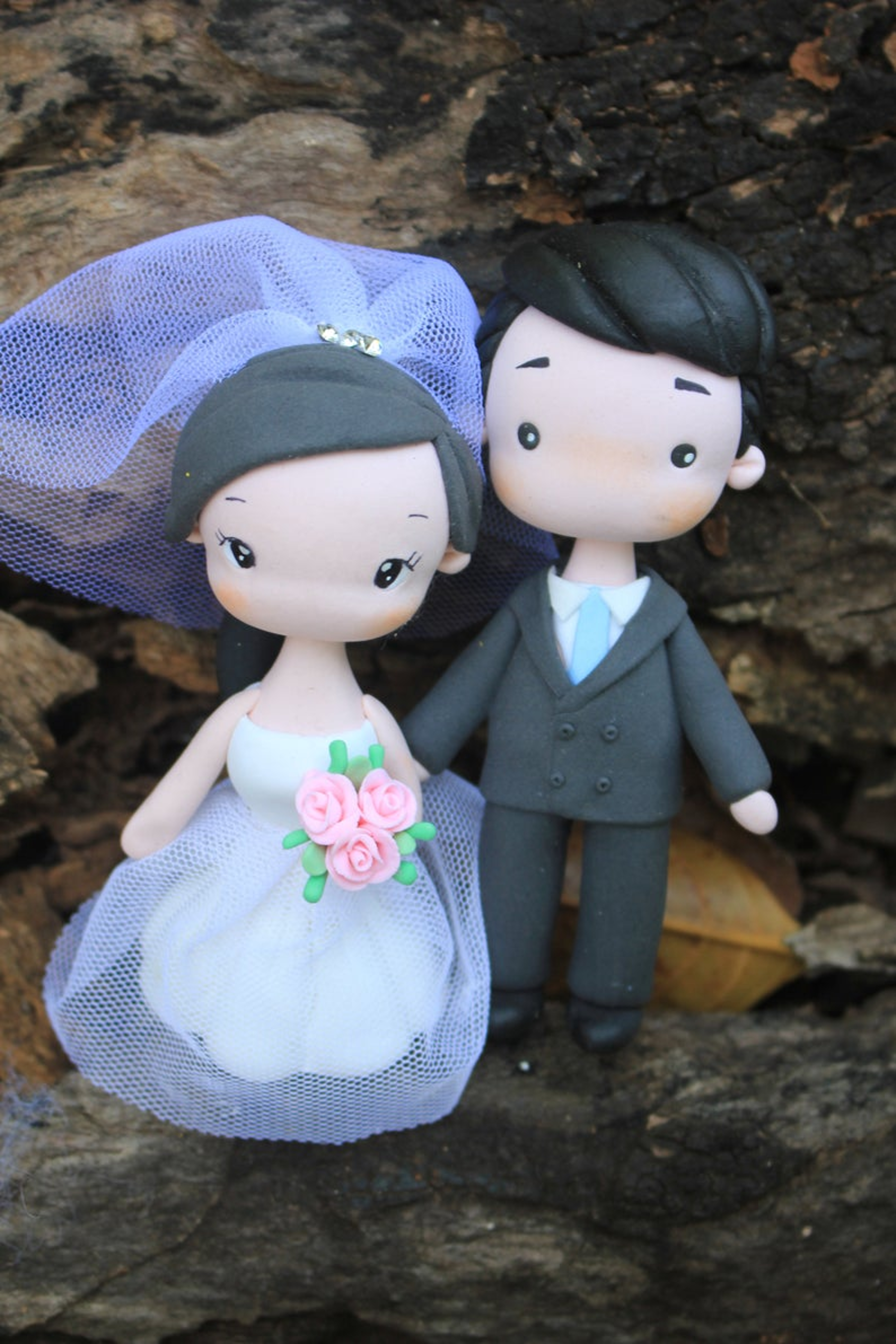 Picture of Baby pink wedding cake topper