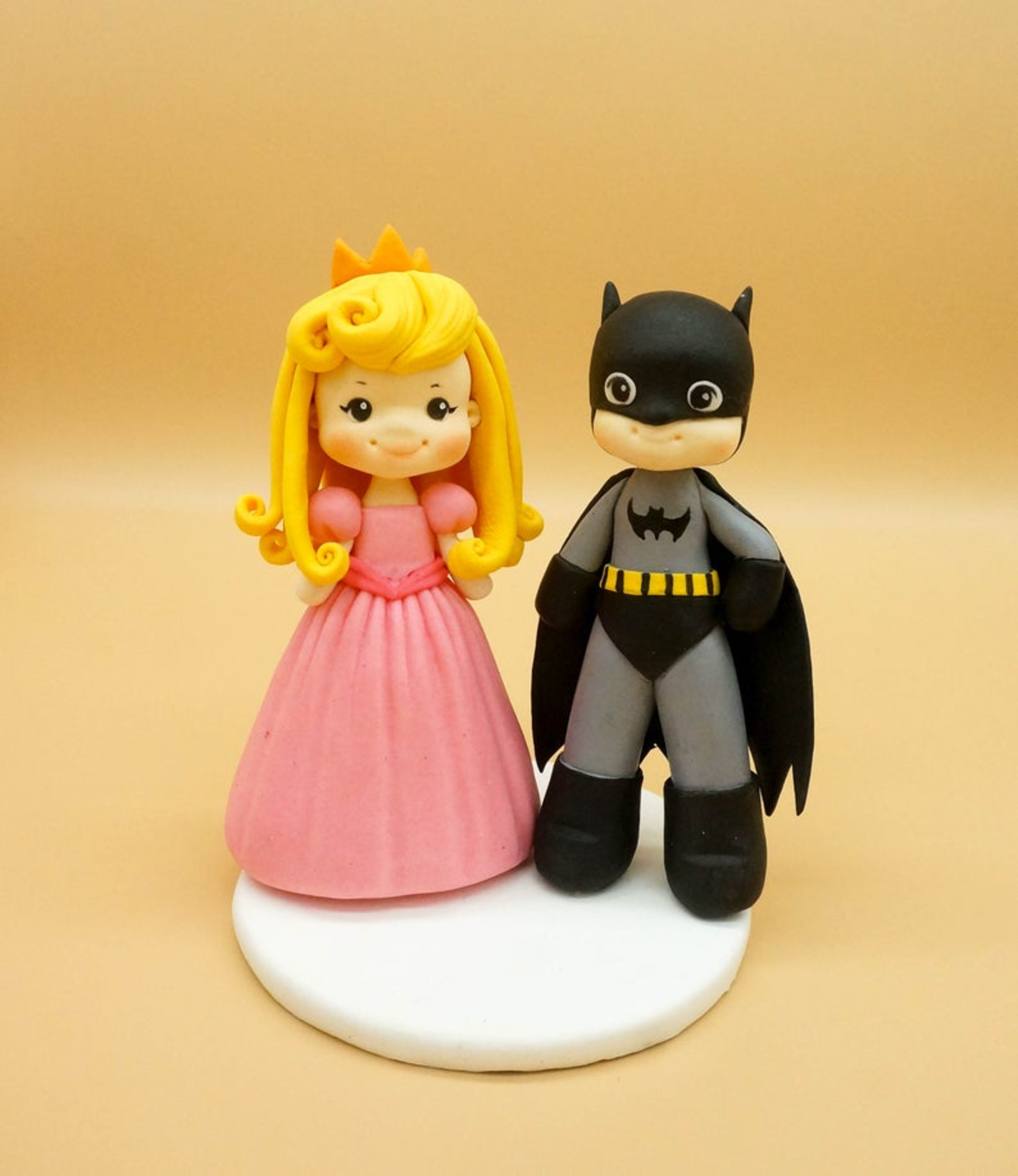 Picture of Batman and Princess Peach wedding cake topper
