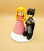 Picture of Batman and Princess Peach wedding cake topper