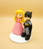 Picture of Batman and Princess Peach wedding cake topper