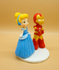 Picture of Iron Man and Cinderella wedding cake topper