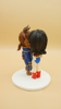Picture of Wonder Woman and The Beast wedding cake topper