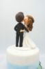 Picture of Cheek Kissing wedding cake topper, Bride kiss groom clay figurine