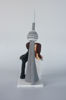 Picture of CN Tower wedding cake topper, Custom Kissing bride & groom with CN tower clay figurine