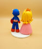 Picture of Princess Peach and Captain America Wedding Cake Topper