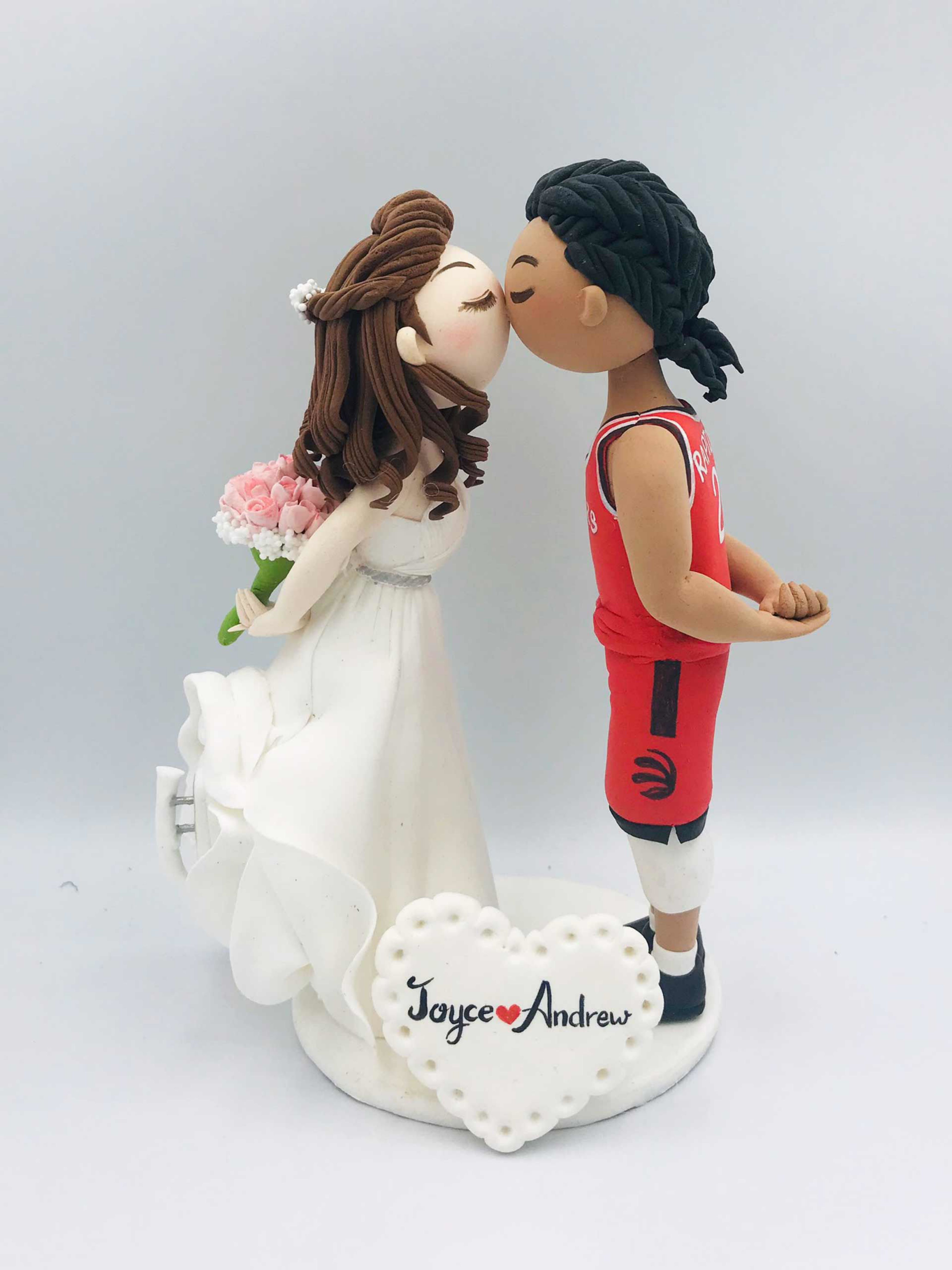 Picture of Basketball & Ice Skating Wedding Cake Topper