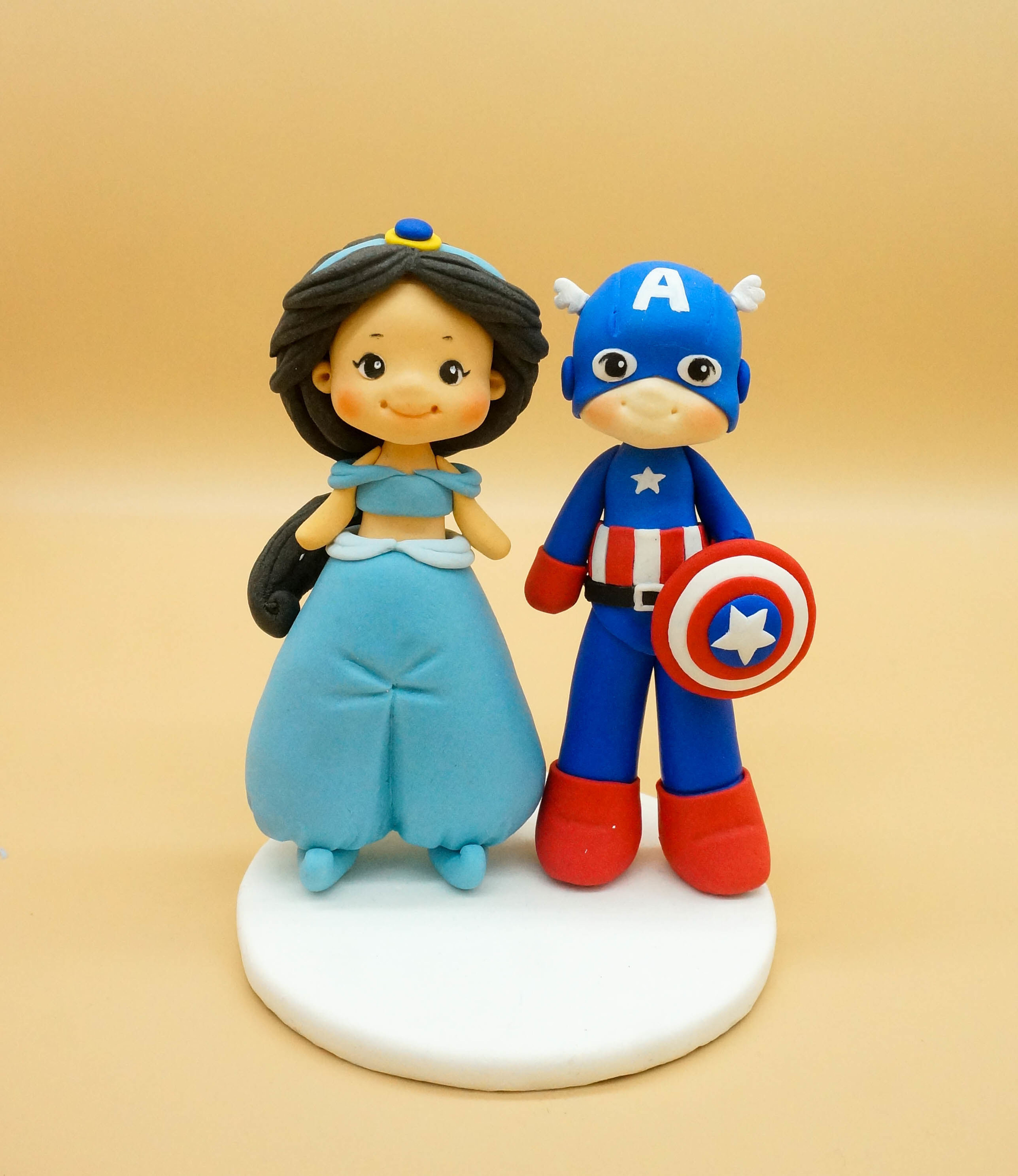 Picture of Princess Jasmine and Captain America Wedding Cake Topper