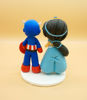 Picture of Princess Jasmine and Captain America Wedding Cake Topper