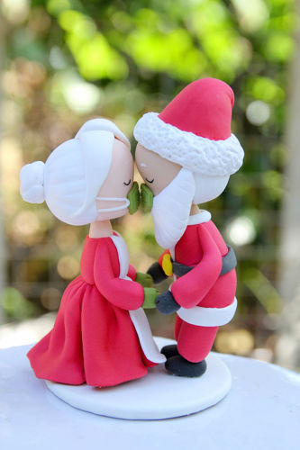 Picture of First Christmas Married Figurine, Kissing Mr & Mrs Santa Claus