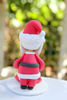 Picture of First Christmas Married Figurine, Kissing Mr & Mrs Santa Claus