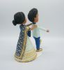 Picture of Bride Chasing Groom Wedding Cake Topper, Indian wedding cake topper