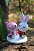 Picture of Cheshire Cat and White Rabbit Wedding Cake Topper