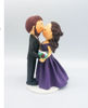 Picture of Kissing Bride & Groom cake topper,  purple theme wedding cake topper