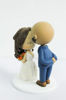 Picture of Forehead kissing wedding cake topper