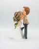 Picture of Police and Nurse with a dog wedding cake topper, Kissing forehead wedding cake topper