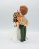 Picture of Police and Nurse with a dog wedding cake topper, Kissing forehead wedding cake topper