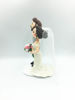 Picture of Mauve wedding cake topper, full beard groom and mermaid bride clay figurine.