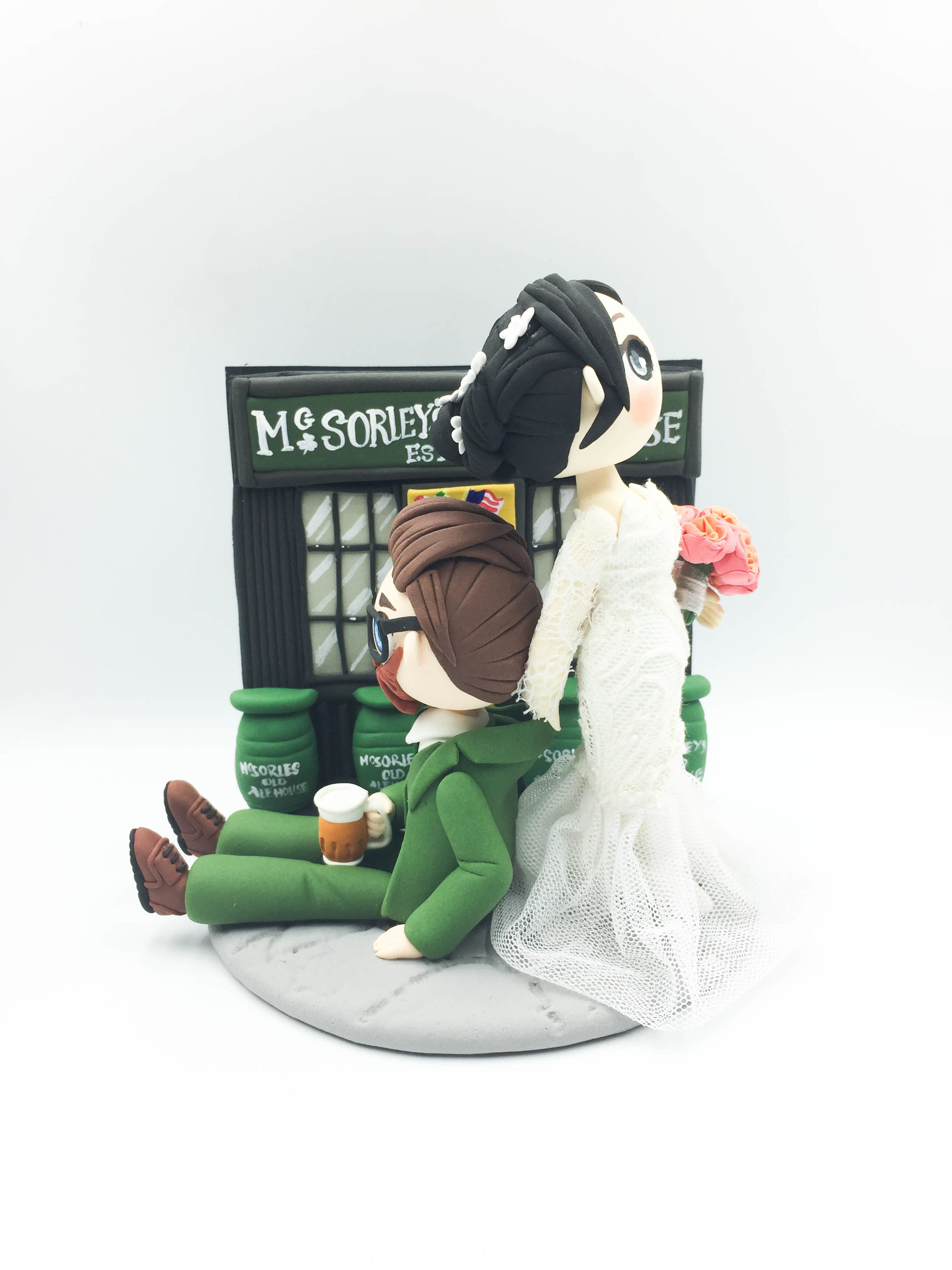 Picture of Funny bride & groom wedding cake topper, Mc Sorley's Old Ale House Wedding Cake Topper