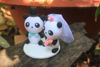 Picture of Panda wedding cake Topper