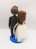 Picture of Woodland bride and groom wedding cake topper