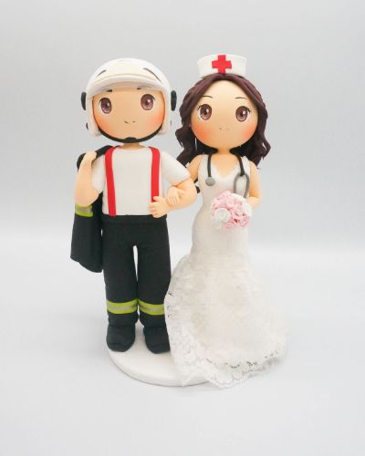 Picture of Firefighter and nurse wedding cake topper