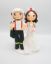 Picture of Firefighter and nurse wedding cake topper