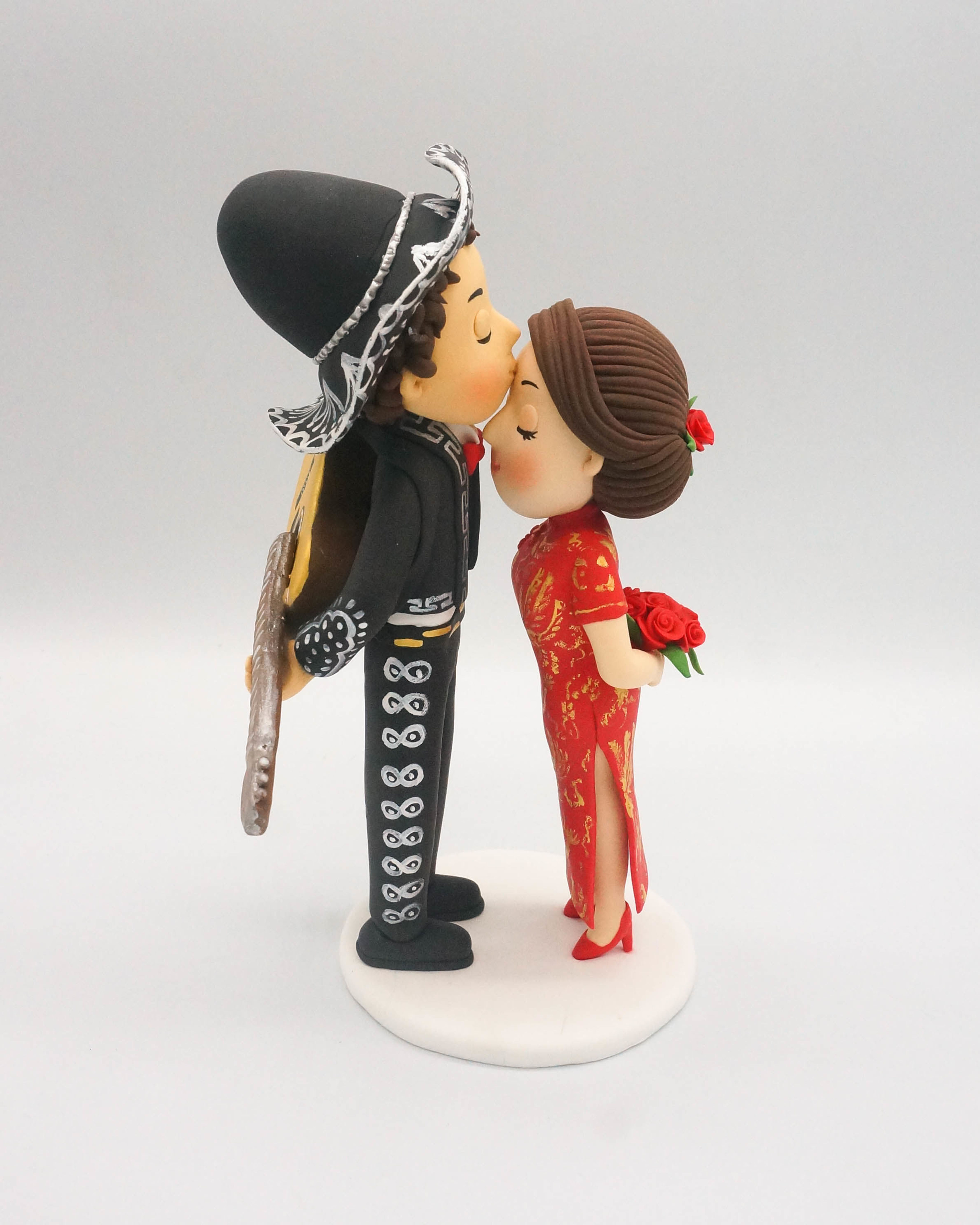 Picture of Chinese and Mexican wedding cake topper, Guitarist wedding cake cake topper