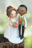 Picture of African wedding cake topper, mixed race wedding couple