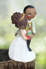 Picture of African wedding cake topper, mixed race wedding couple