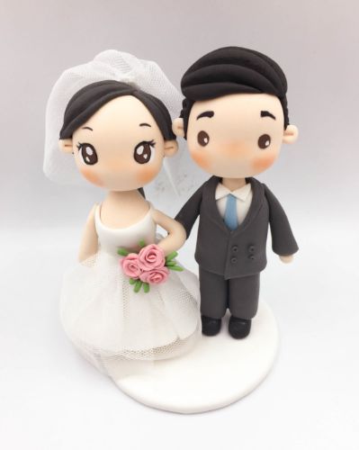 Picture of Wedding Cake Topper, Pink & Blue Bride and Groom Cake Topper