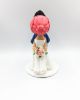 Picture of Pink hair bride and glasses groom wedding topper, Kissing wedding cake topper