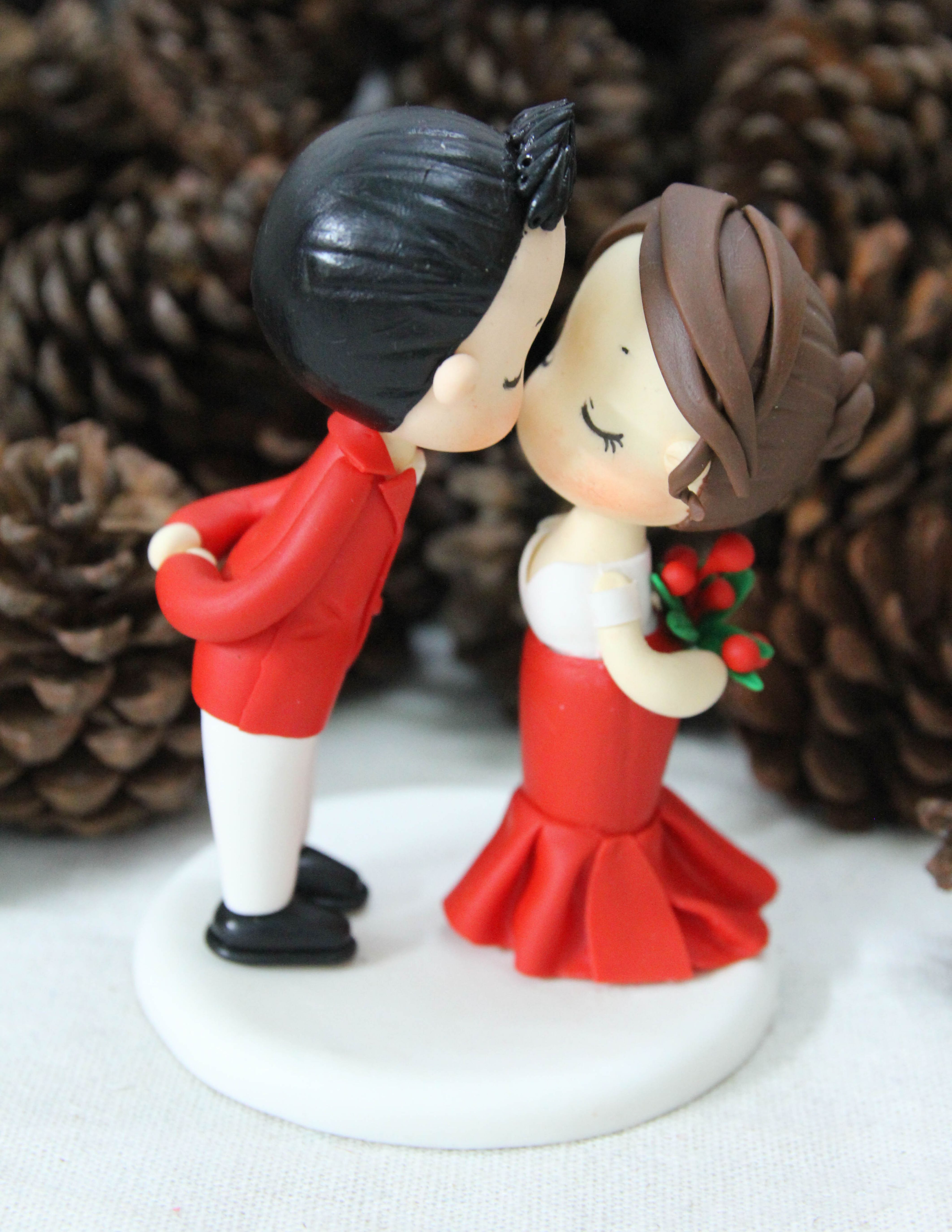 Picture of Kissing Christmas Wedding Cake Topper, White and Red Wedding Theme