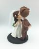 Picture of Rustic Wedding Cake Topper, Kissing Bride and Groom Wedding Figurine