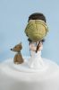 Picture of Harry Potter & Star Wars wedding cake topper, bride & groom with dog cake topper