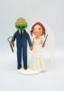 Picture of Ninja Turtle and Hogwarts Bride Wedding Cake Topper