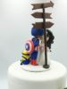 Picture of Captain America Groom and Nurse Bride wedding cake topper Marvel Harry Potter Pokémon Minion Disney Inspire Wedding Cake Topper