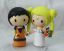 Picture of Son Goku and Sailor Moon wedding cake topper- Anime inspire wedding theme