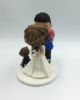 Picture of Football groom Iron Man and Doctor Who Bride Wizard dog inspire wedding cake topper