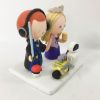Picture of Rapunzel princess and Harry Potter wedding cake topper Pokemon Star Wars Wall E and Eve inspire wedding 