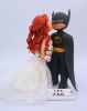 Picture of Batman Groom & Ariel Bride Wedding Cake Topper, Cheek Kiss Wedding Cake Topper