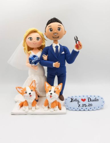 Picture of Electric Technician Groom & Blonde hair bride Wedding Cake Topper with Dogs, Muscular Groom Figurine