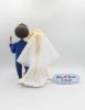 Picture of Electric Technician Groom & Blonde hair bride Wedding Cake Topper with Dogs, Muscular Groom Figurine