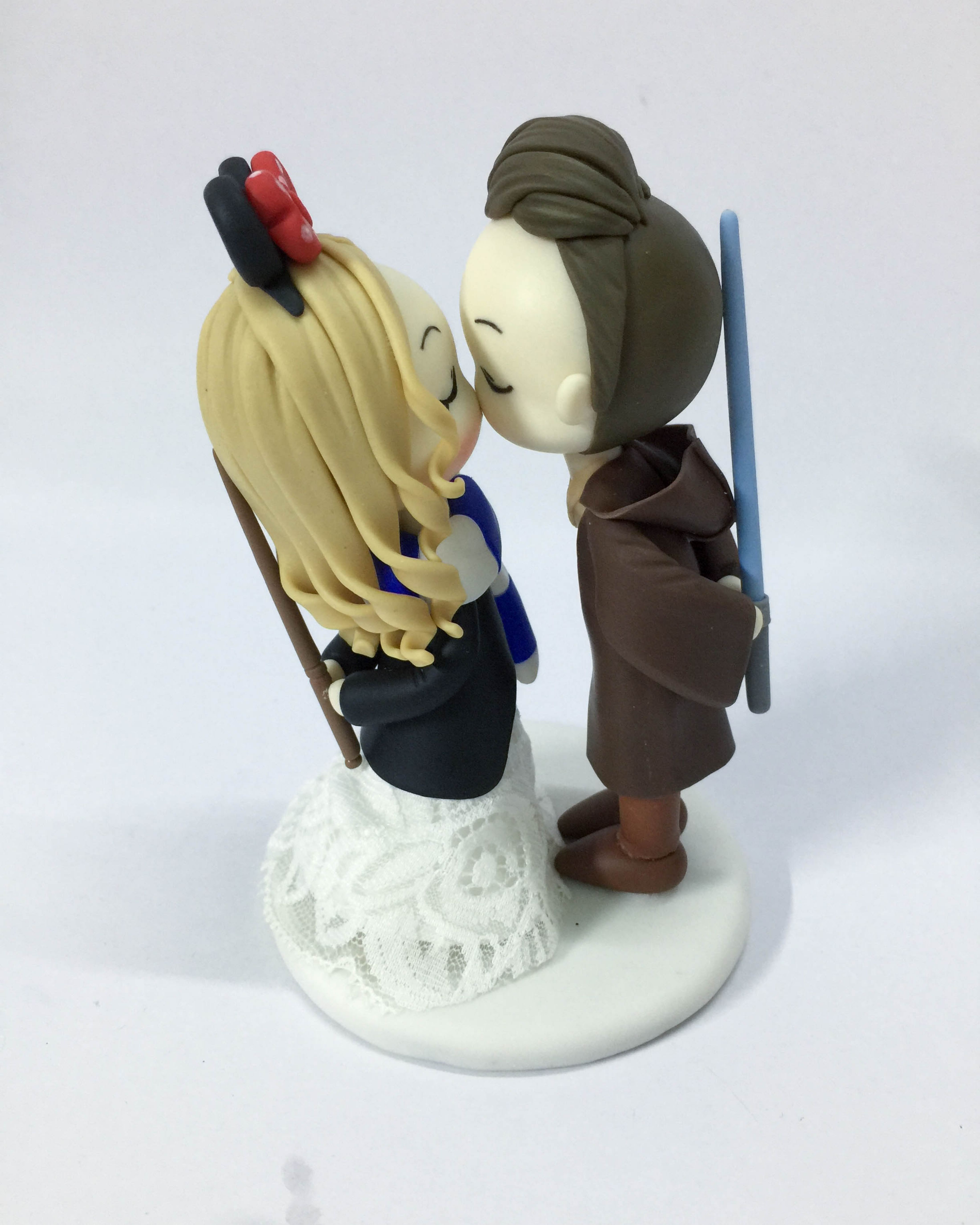 Picture of Han Solo Groom And Ravenclaw Bride Wedding Cake Topper, Harry Potter inspire wedding theme, Disney wedding theme and Star wars wedding topper