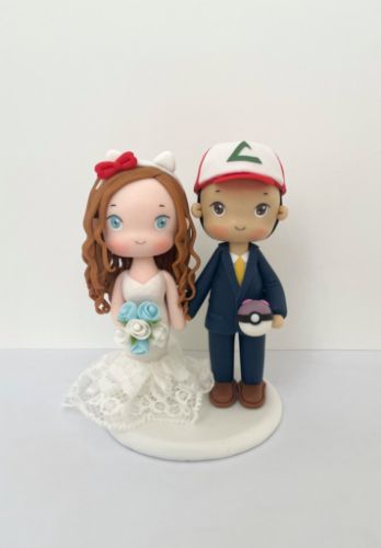 Picture of Pokemon & Hello Kitty Wedding Cake Topper, Ash Groom & Hello Kitty Bride Clay Figurine
