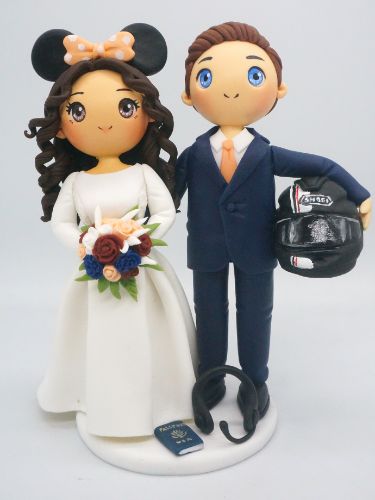 Picture of Motorcycle Racer Groom & Minnie Mouse Bride Wedding Cake Topper, Traveler and Gamer wedding cake topper