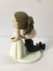 Picture of Bride Dragging Groom Wedding Cake Topper, Wind Lovers groom & bride topper, Funny Wedding cake topper